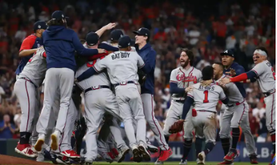 The Braves celebrated after getting the last out of game 6, making them champions.