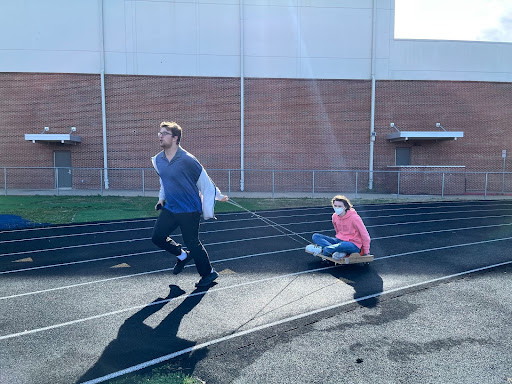 Students mid-way through a chariot race. 