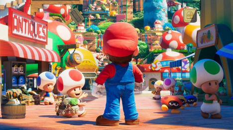 Mario staring off into the Mushroom Kingdom accompanied by Toad in the 2023 Super Mario Bros. Movie.
