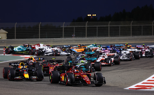 F1 Cars Racing Along a Track, Cr: Formula 1 